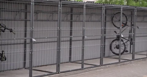 Windproof Bike Garage Secure Storage with Vertical Suspension for Bicycles Vídeos de archivo 243198153