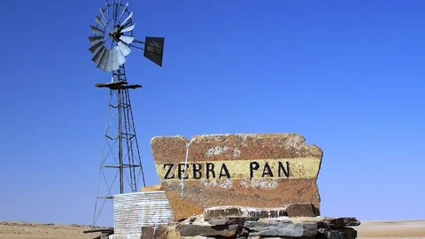 WIndpump at Zebra Pan Video stock 117047028