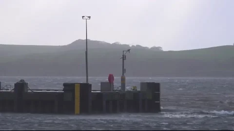 Winds lash the Largs seafront in North Ayrshire, as Storm Amy is set to hit the Stock Footage 318314110