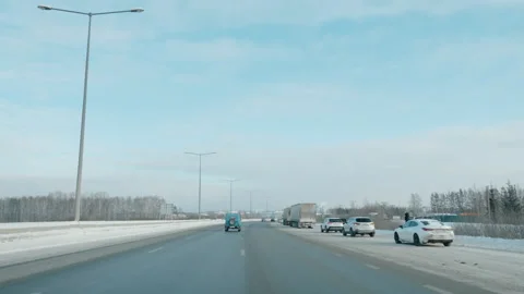 Windscreen view driving through a winter road with mud. Media. Stock-Footage 168409593