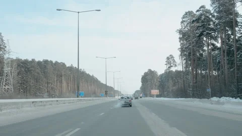 Windscreen view driving through a winter road with mud. Media. 스톡 동영상 172137213