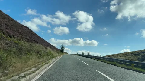 Windscreen view driving on the top of Snake Pass Snake Road A57 Vídeos de archivo 259383725