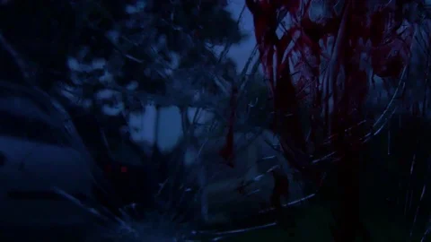 Windshield of car broken in after an accident, reflects diffuse red, blue am Stock Footage 124091278