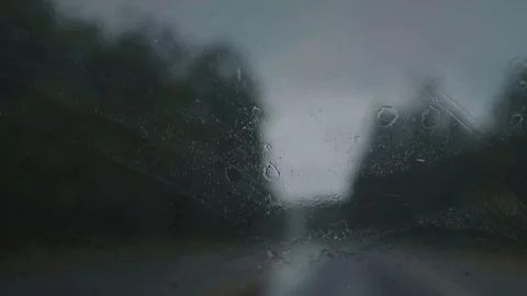 Windshield of a car on a rainy day Video stock 128142633
