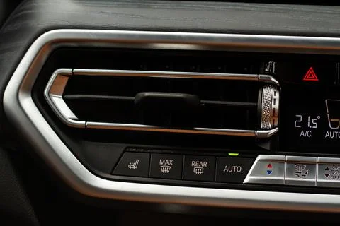 Windshield defrost button. Modern car interior details. Windshield heating cl Stock Photos