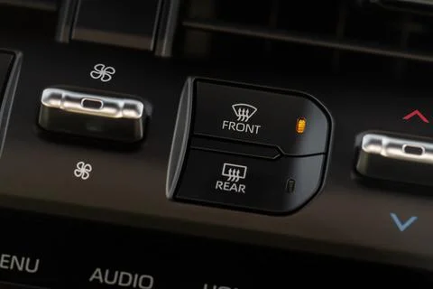 Windshield defrost button. Modern car interior details. Windshield heating cl Stock Photos