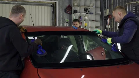 Windshield Fitting. Auto Glass Replacement Stock Footage 218979198