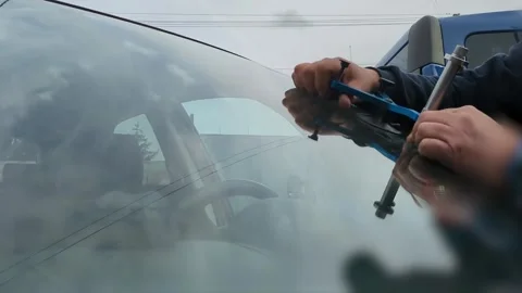 Windshield Repair in 4K, Injecting Adhesive into Crack, Car Glass Fix, Professio Stock Footage 333134195
