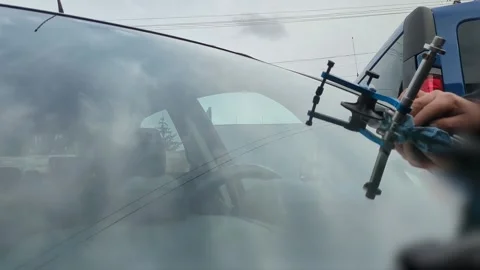 Windshield Repair, Injecting Adhesive into Crack, Car Glass Fix, Professiona Stock Footage 331068241