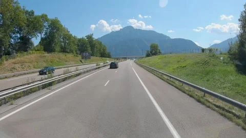 Windshield view of a car moving on a scenic freeway Vídeo Stock 252531314