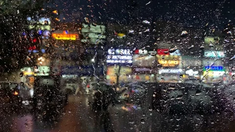 Windshield view of a car parked in a rain, looking from inside. Stock Footage 126367458