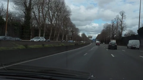 Windshield View. Driving Car Moving Along Highway in Paris Suburbs. France E Stock Footage 129223864