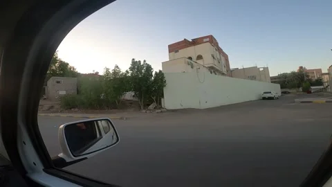 Windshield View Driving Past Al Haram Center into Golden Sunset Vídeo Stock 333076678