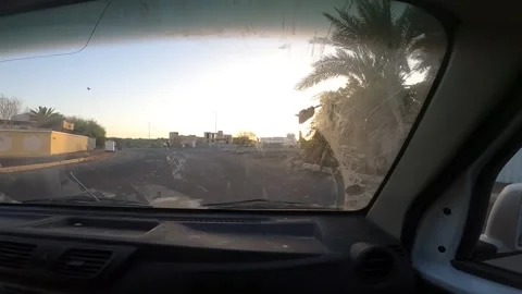 Windshield View Driving Past Palm Trees and Ruins Video stock 333076790