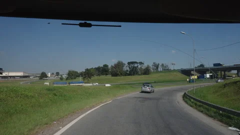 Windshield View of a Highway Off-Ramp and Overpass Stock Footage 340559984