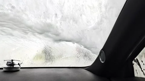 Windshield View From Inside Car Cabin During Automatic Water Rinsing Stock Footage 336638027