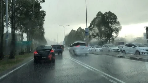A windshield view inside the car while raining heavily. Stock Footage 104269721