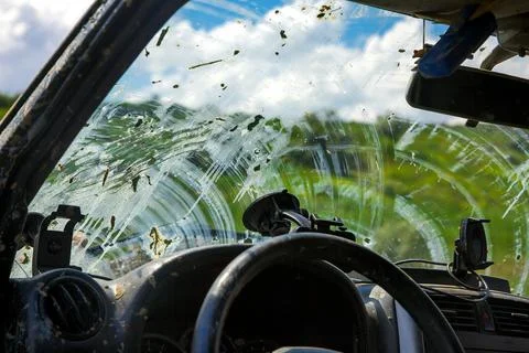 Windshield view from the interior of a car through a window. Stock Photos