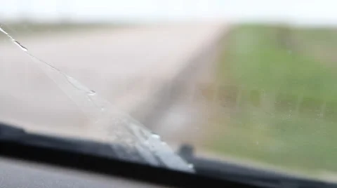 Windshield washer fluid from wiper nozzles clean the glass Видео 50128564