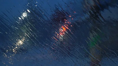 Windshield While Snowing and Raining Outside. Water Melts Stock Footage 101517104