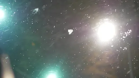 Windshield wiper in a car cleans snow Stock Footage 143854947