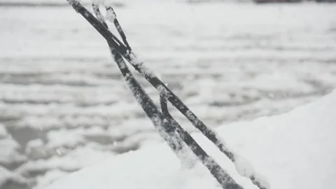 Windshield wiper in falling snowy weather Stockbeeldmateriaal 162626396
