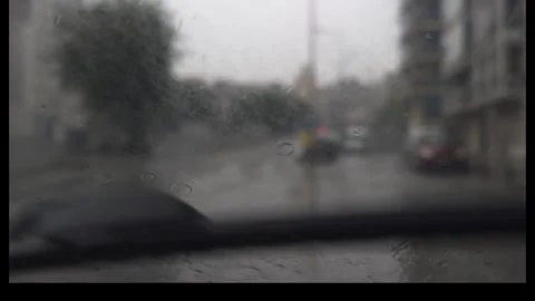 Windshield Wipers and Blurred Traffic Bokeh Video stock 327589916