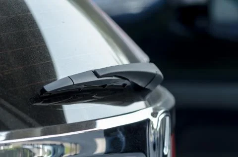 Windshield wipers help wipe the rainwater. While driving cars in the rainy ti Stock Photos
