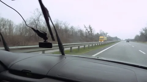 Windshield wipers on highway slow motion Stock-Footage 74693418