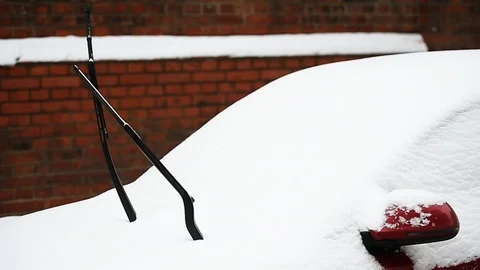 Windshield wipers lifted after heavy snowfall Stockbeeldmateriaal 87478079