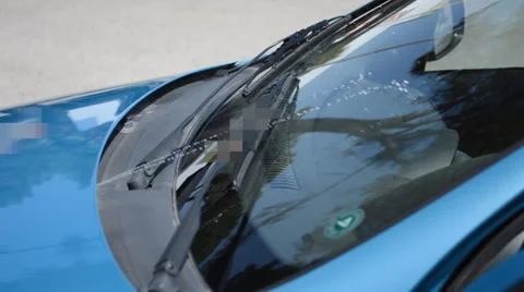 Windshield Wipers Spraying Washing Fluid Onto Windows Stock Footage 51258200