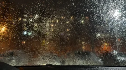 Windshield wipers trying to clear an icy windshield Stock Footage 256078189