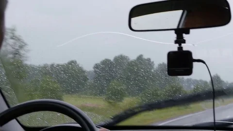Windshield wipers wipe the car glass Stock Footage 80150420