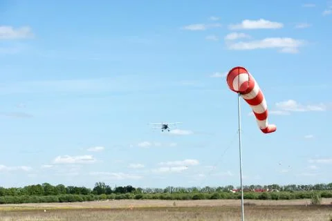 Windsock against cloudy sky. 스톡 사진
