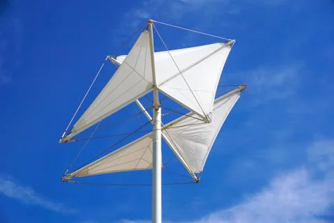 Windsock inflated by the wind on the sky Stock Photos