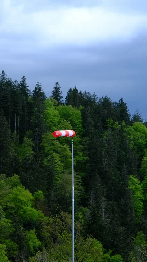 Windsock in the mountain forest shows a wind Stock Footage 278115917
