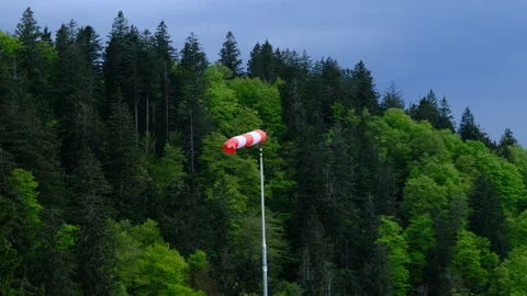 Windsock in the mountain forest shows a wind Stock Footage 278117664