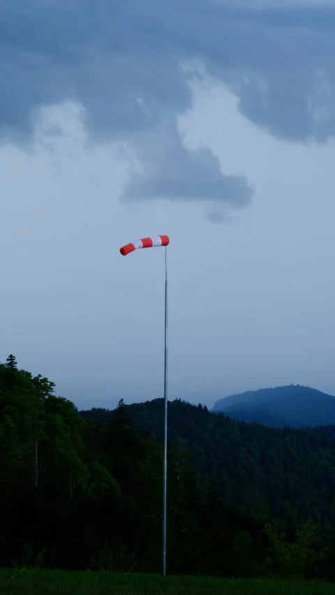 Windsock in the mountains shows a wind of storm Vídeos de archivo 278113244