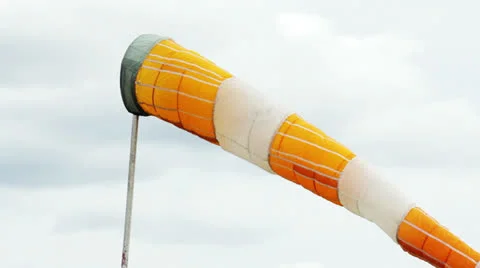 Windsock shows wind direction in airport Видео 23959248