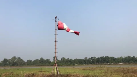 Windsock by the side of a runway Video stock 147194653