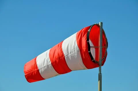 The windsock on the sky background Stock Photos