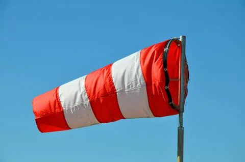 The windsock on the sky background Foto stock
