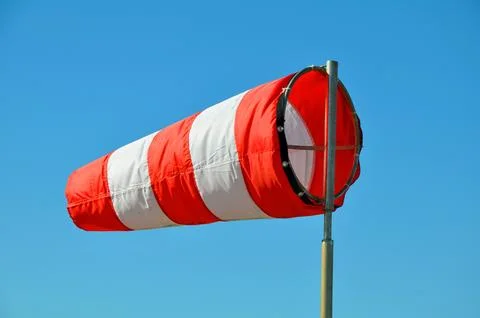 The windsock on the sky background Stock Photos