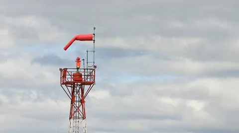 Windsock Tower and Cloudy Sky Stock Footage 11112667
