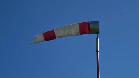 Windsock in wind against blue sky Stock Footage 151977885
