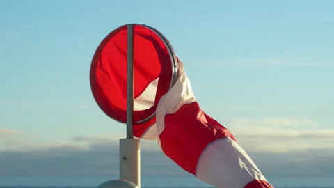 Windsock. Wind indicator rises up and falls down. Calm. Close-up. Wind indicator Stock Footage 231512859