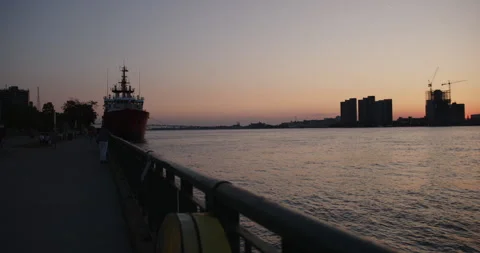 WINDSOR, ONTARIO, CANADA - MAY 30 2023: Windsor Waterfront during Sunset Stock Footage 250495237