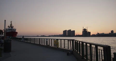 WINDSOR, ONTARIO, CANADA - MAY 30 2023: Windsor Waterfront during Sunset Stock Footage 250495301