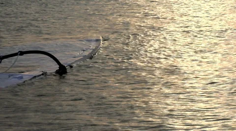 Windsurf lying in water 2 Stock Footage 33330908