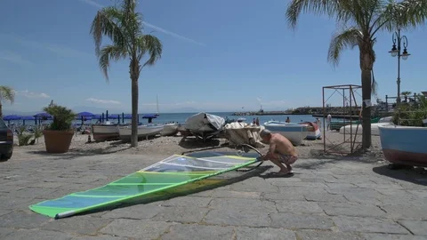 Windsurf maintenance Stock Footage 90058038